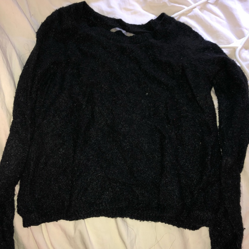 Good used condition, black sweater